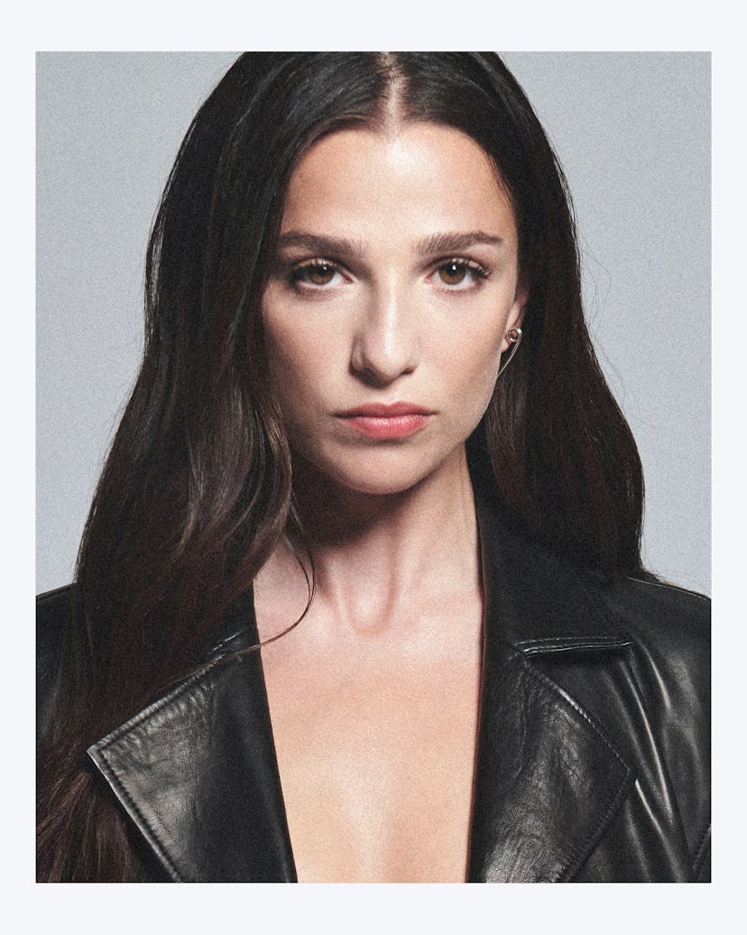 A portrait of Industry Star Marisa Abela wearing a black leather blazer