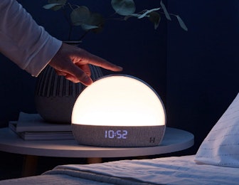 The Hatch Restore features pink noise, an alarm clock, a night light, and more restful features. 