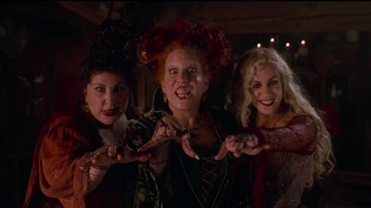 Kathy Najimy, Bette Midler, and Sarah Jessica Parker as the Sanderson Sisters.
