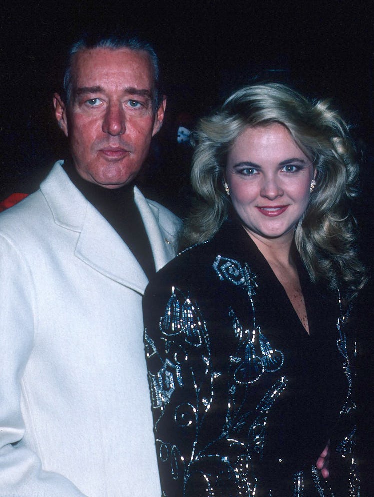 Cornelia Guest in a black sequin jacket and Roy Halston in a black turtleneck and a white blazer