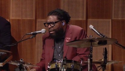 Questlove on the drums looking shocked.