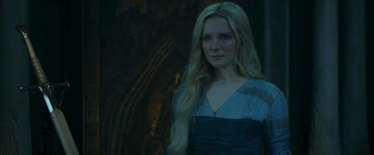 Galadriel (Morfydd Clark) stands next to a very familiar looking sword in The Lord of the Rings: The...