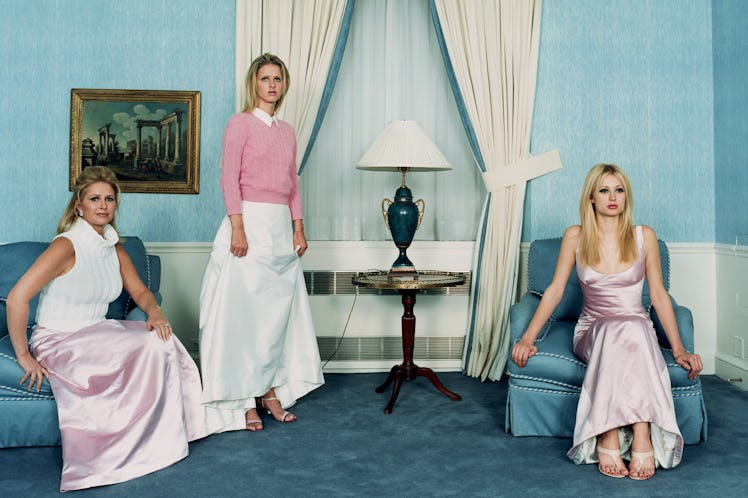 Kathy, Nicky and Paris Hilton sit in a blue room
