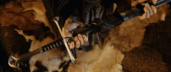 Elrond (Hugo Weaving) holds a reforged version of Narsil in 2003’s The Lord of the Rings: The Return...
