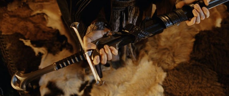 Elrond (Hugo Weaving) holds a reforged version of Narsil in 2003’s The Lord of the Rings: The Return...