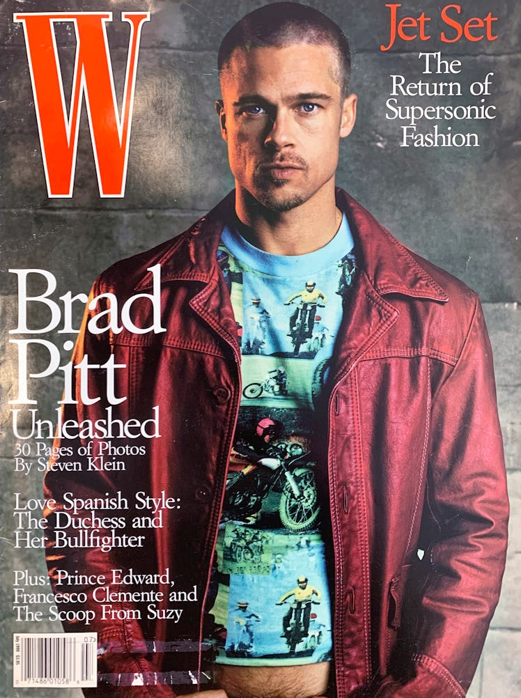 Brad Pit in a blue shirt and a red leather jacket on the cover of W Magazine