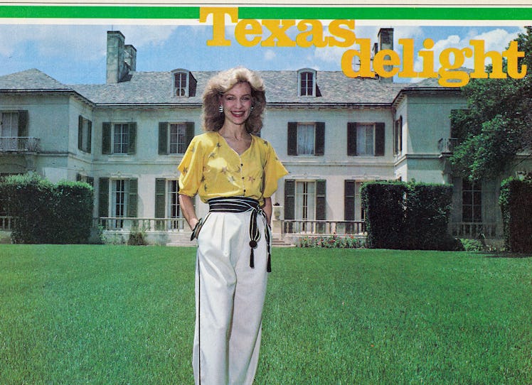 Lynn Wyatt in front of her home in a yellow blouse and white trousers