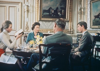 Queen Elizabeth II lunches with Prince Philip and their children Princess Anne and Prince Charles at...