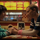 Eleven and Mike sit at a table in 'Stranger Things' just like the 'Stranger Things' brunch inspired ...