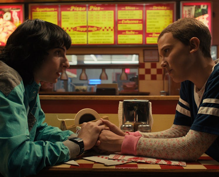 Eleven and Mike sit at a table in 'Stranger Things' just like the 'Stranger Things' brunch inspired ...