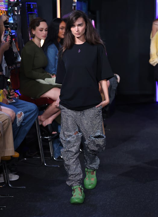 Emily Ratajkowski walks the runway at the JW Anderson show during London Fashion Week September 2022...