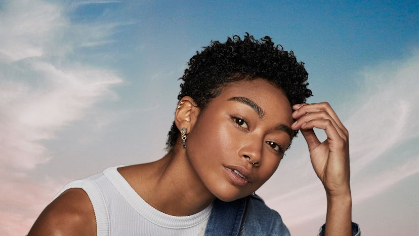 Tati Gabrielle played Marienne Bellamy on 'You' with a short, naturally curly pixie haircut.