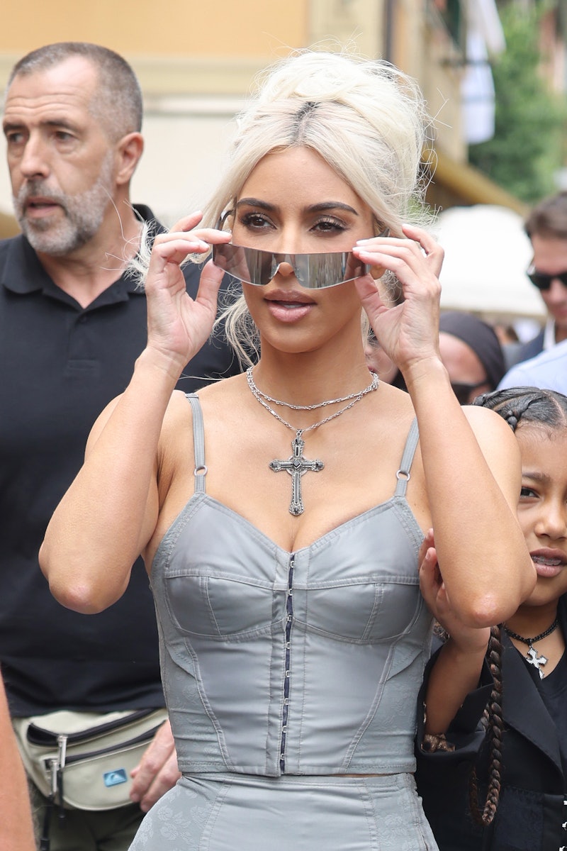Kim Kardashian wearing reflective sunglasses