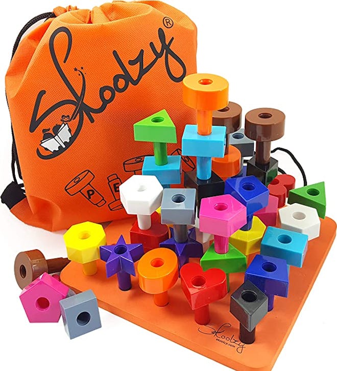 TheSkoolzy Peg Board is one of the best gifts for 2-year-olds.