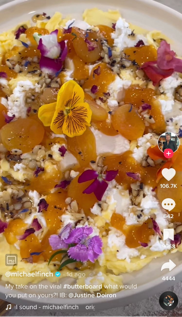 Adding edible flowers is one of the butter board ideas from TikTok. 