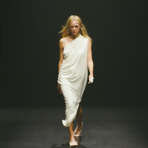 Interior's Spring/Summer 2023 Grecian goddess-worthy white one-shoulder dress.
