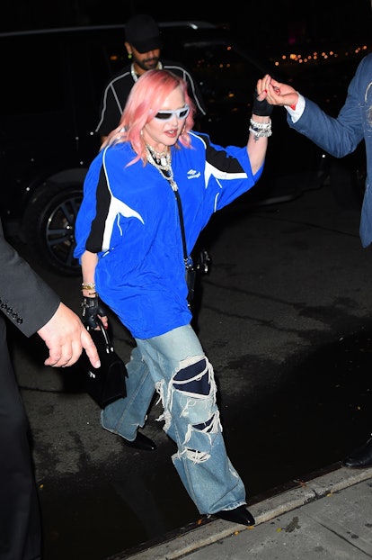 Madonna out on the town in New York City in a look channeling Rihanna