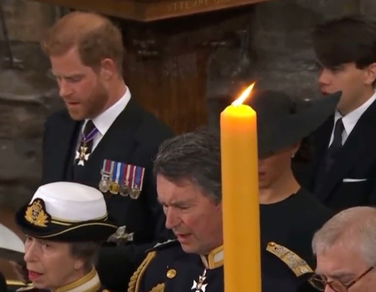 Candle blocking Meghan Markle during funeral livecast.