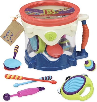 The B. toys Drumroll Please 7 Musical Instruments Toy Drum Kit is one of the best gifts for 2-year-o...