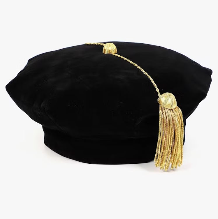 Adjustable black velvet cap with gold tassel