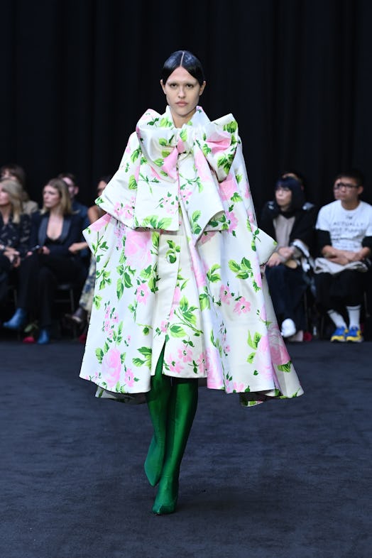 Oversized bow-tie floral dress styled with emerald boots by Richard Quinn tributing Queen Elizabeth ...