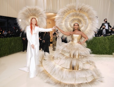 Harris Reed and Iman attend the 2021 Met Gala wearing massive feathered hats