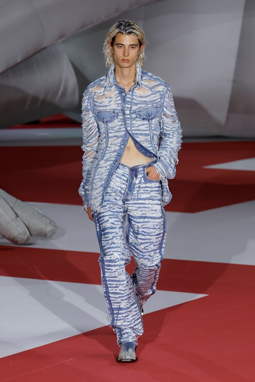 A model in a denim suit at the Diesel Fashion Show during the Milan Fashion Week Womenswear Spring/S...