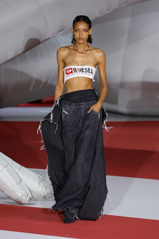 A model in a top and skirt at the Diesel Fashion Show during the Milan Fashion Week Womenswear Sprin...