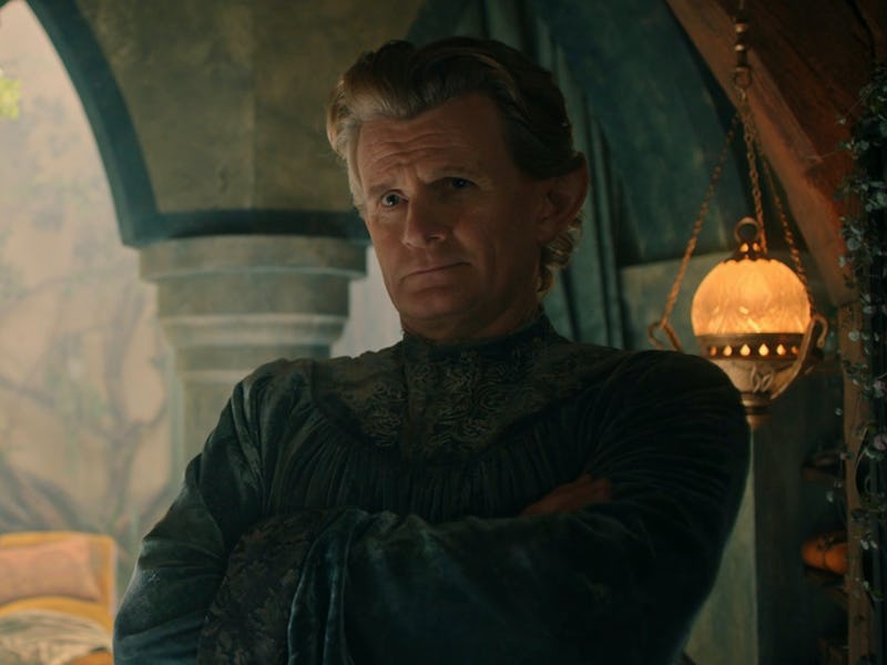 Celebrimbor (Charles Edwards) stands with his arms folded in The Lord of the Rings: The Rings of Pow...