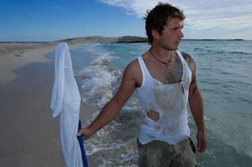 Stock image of a man on a desert island.