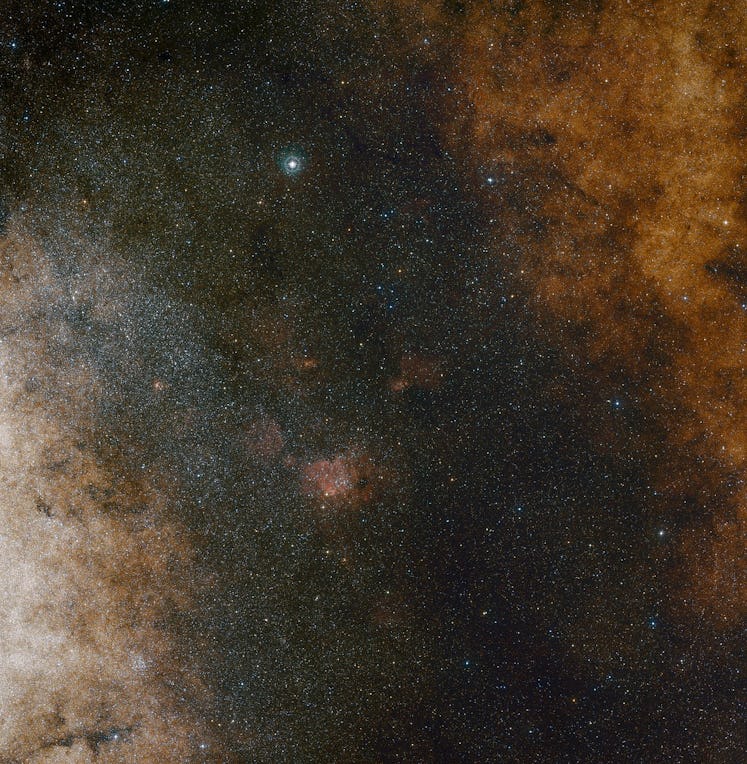 A visible light wide-field view of the center of the Milky Way.  Numerous points of light appear in ...