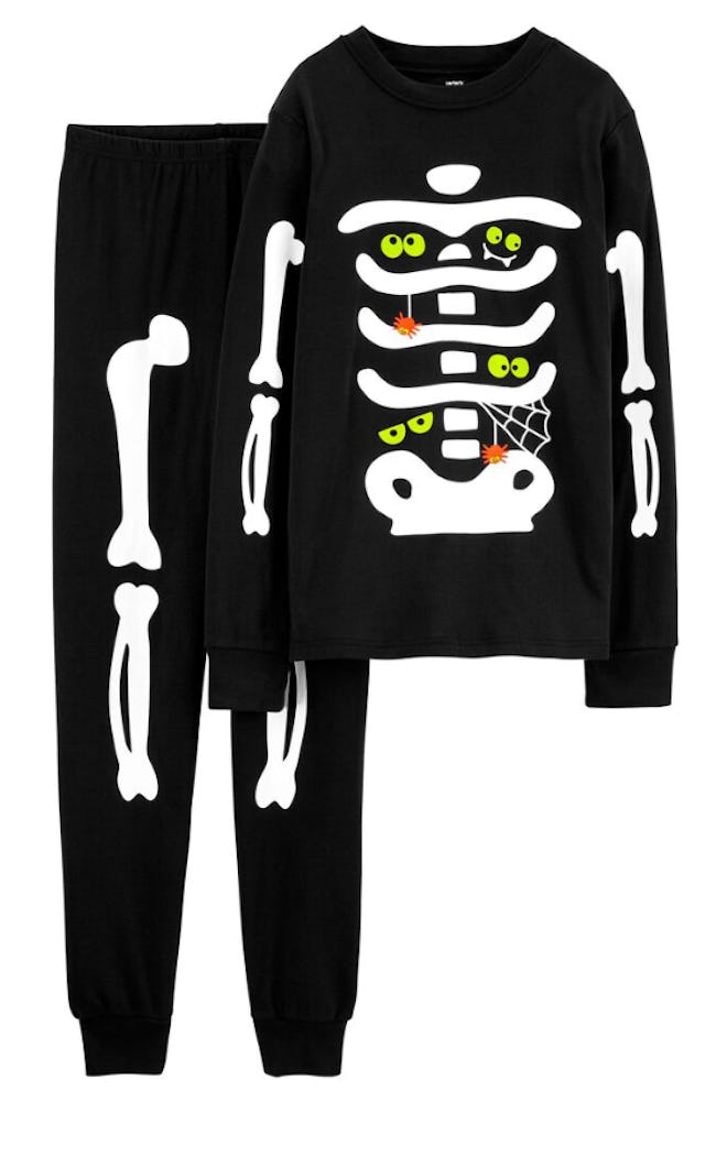 These Adult 2-Piece Skeleton Snug Fit Halloween Pajamas are some of the best Halloween family matchi...