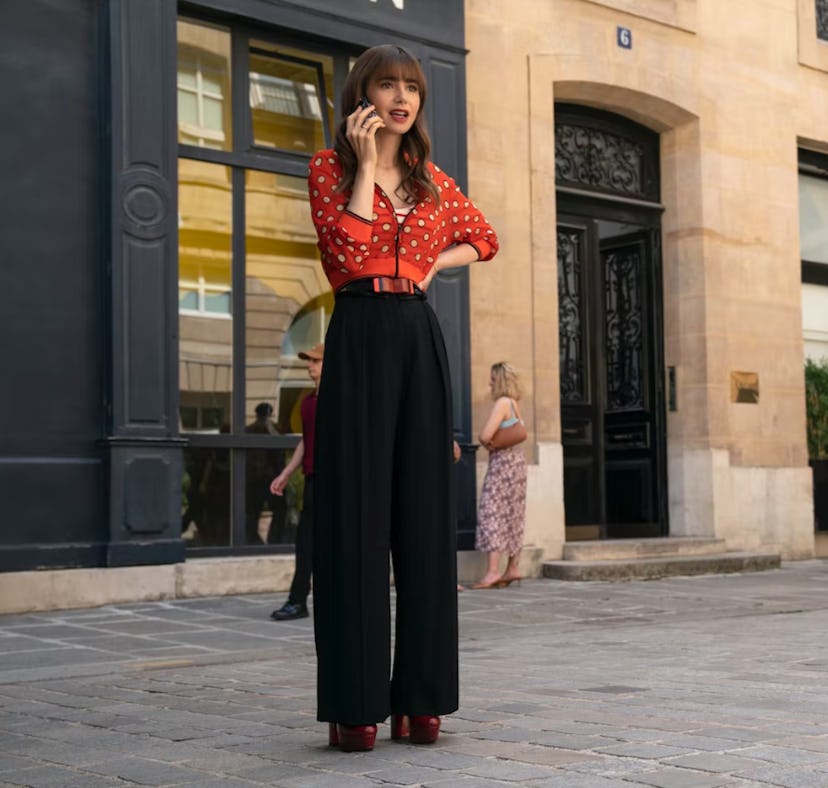 Lily Collins as Emily Cooper with bangs in 'Emily in Paris' season 3.