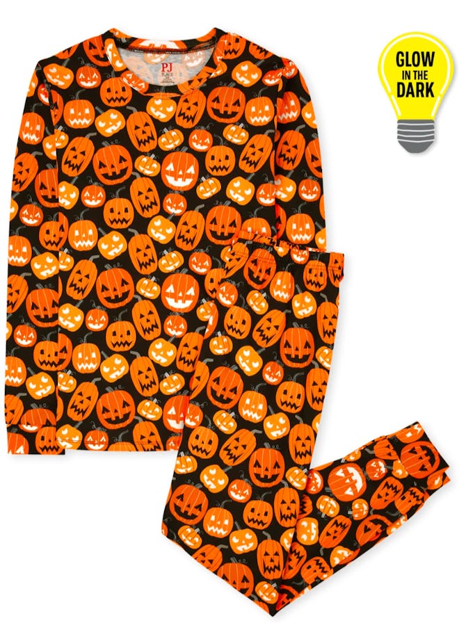 These Unisex Adult Matching Family Glow Pumpkin Patch Pajamas are some of the best Halloween family ...