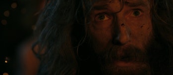 The Stranger (Daniel Weyman) looks to the sky in The Lord of the Rings: The Rings of Power Episode 2