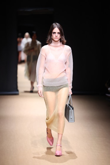  A model walks the runway of the Prada Fashion Show during the Milan Fashion Week Womenswear Spring/...