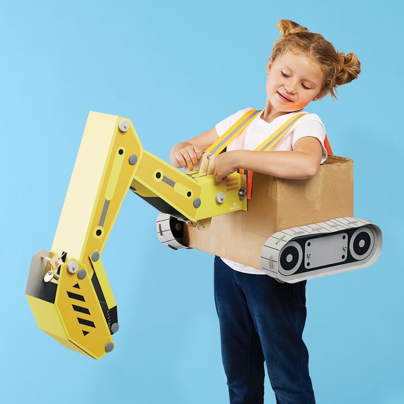 Little girl using construction excavator halloween costume