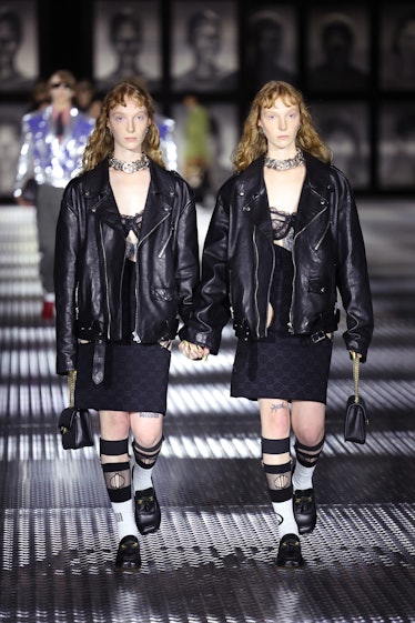 Models walk the runway at the Gucci Twinsburg show during Milan Fashion Week Spring/Summer 2023 on...