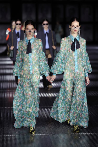 Gucci's Spring 2023 Runway Program Takes Twinning to a New Level 14 Models walk the runway of the Gucci Twinsburg Show during Milan Fashion Week Spring/Summer 2023 on S...