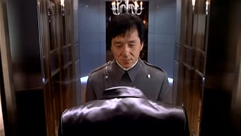 Chauffer Jimmy Tong admires his super-spy boss’s tuxedo.