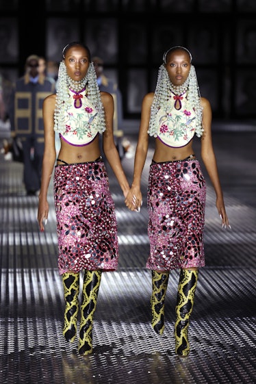 Models walk the runway of the Gucci Twinsburg Show during Milan Fashion Week Spring/Summer 2023 on S...