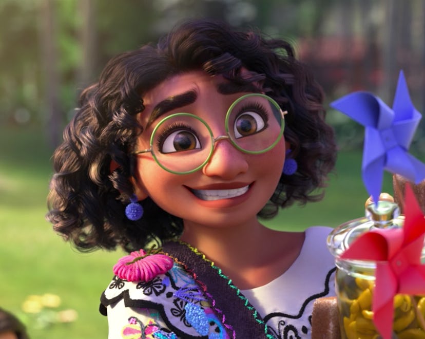 Mirabel smiles awkwardly in 'Encanto.'