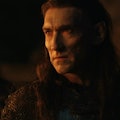 Adar (Joseph Mawle) stands next to an orc in The Lord of the Rings: The Rings of Power Episode 5