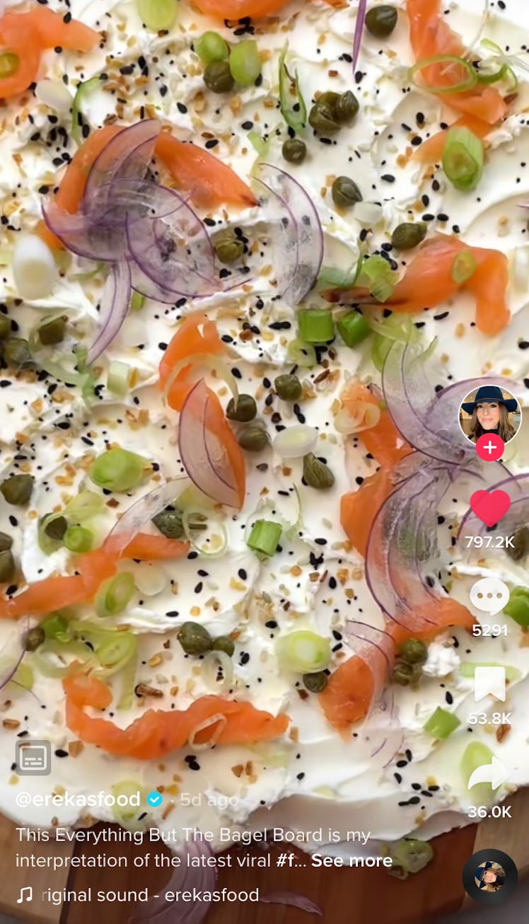 This cream cheese board idea from TikTok has lox, capers, and red onions on top. 