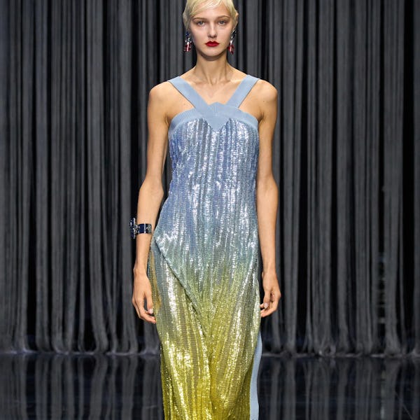 Ferrari's blue-and-yellow gradient shimmery dress with halter neck from Spring/Summer 2023 Collectio...