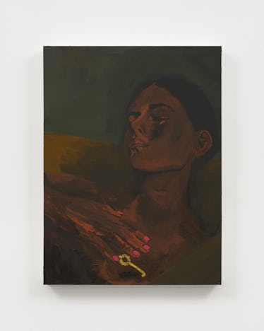 Artist Danielle Mckinney on 'Golden Hour' at Marianne Boesky Gallery 4 A Black woman with bright pink nail polish on her hands, her hands to at her chest holding a golden ...