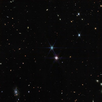 Wide-field image taken by the JWST captures glittering stars and planets, including Neptune and its ...