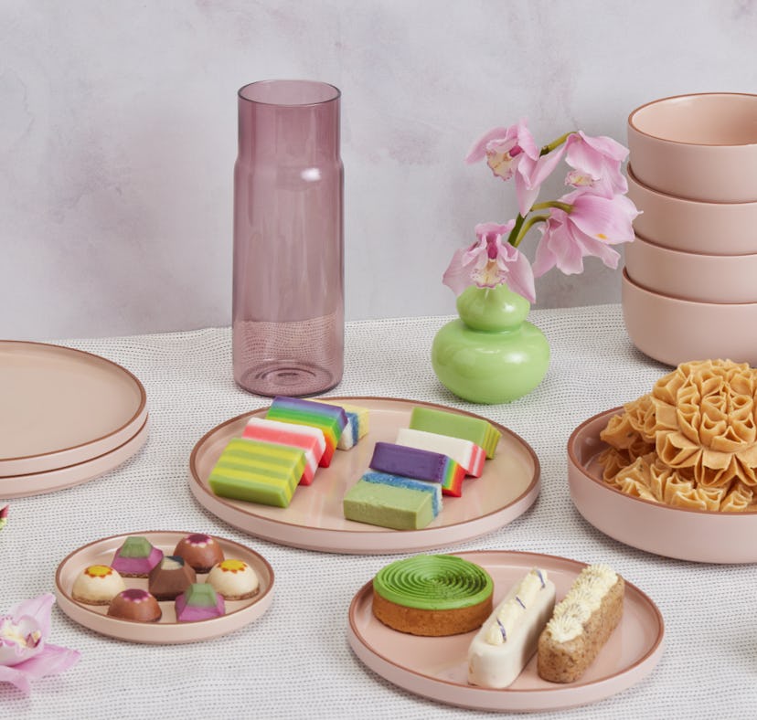 Our Place's tableware collection 2022 has plates, bowls, and serving platters.