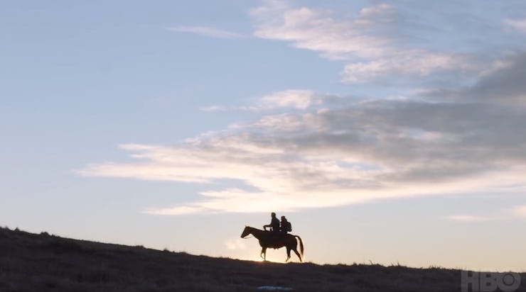 The Last of Us trailer scene with a couple riding a horse on a hill