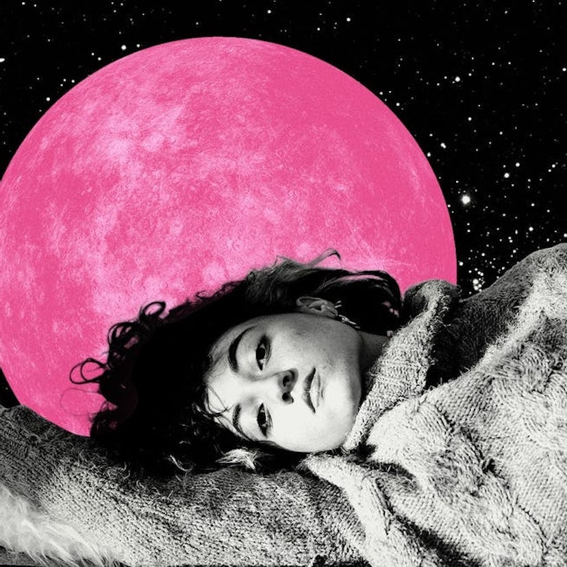 Young woman in front of a pink planet, showing one of the retrograde planets in October 2022.